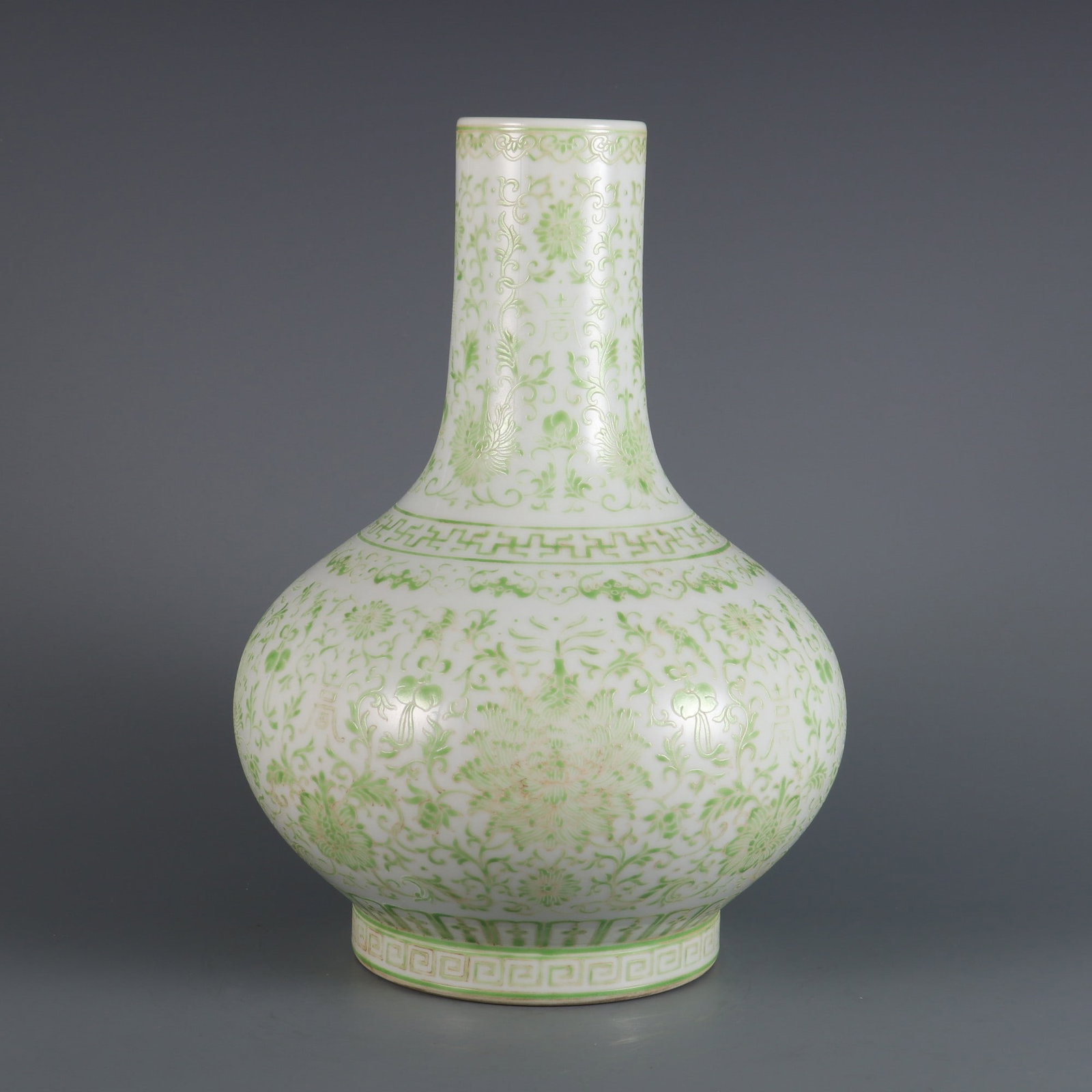 A Rare Green Color Interlocking Lotus Pattern Vase: A Rare Green Color Interlocking Lotus Pattern Vase,Qing Dynasty, China,Qianlong Six-character Mark,Size:11.7inx8.1in 绿彩缠枝莲纹瓶,中国清&#