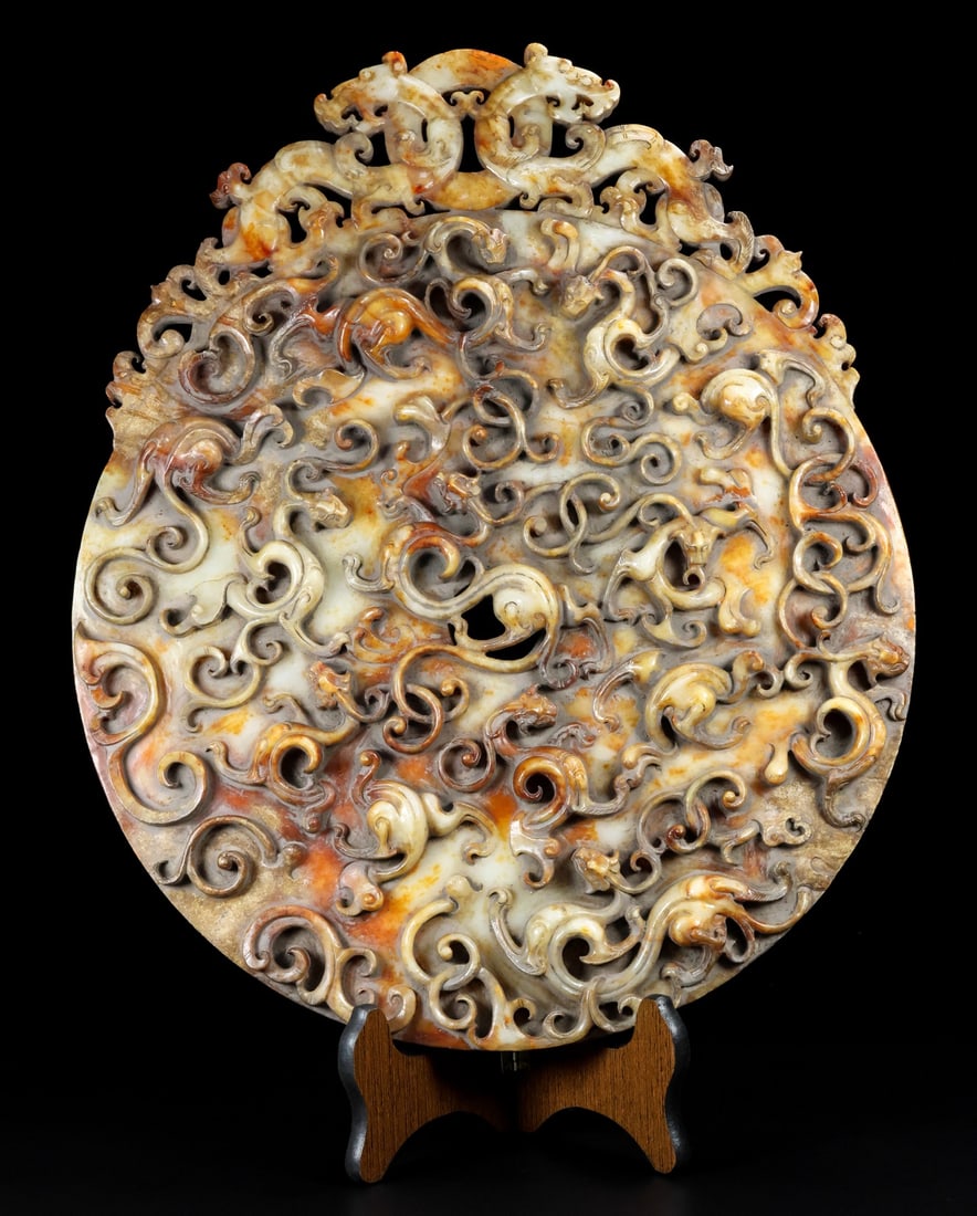 A Rare Hetian Jade Nine-Dragon Bi Disc (1 of 9)