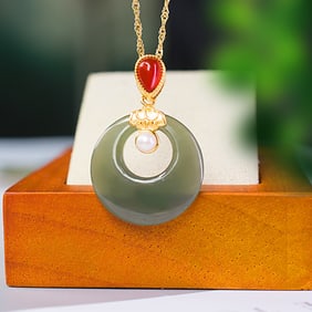 A Exquisite Silver Inlaid Hotan Jade Pendant