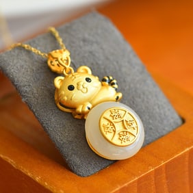 A Exquisite Silver Inlaid Hotan Jade Tiger-shaped Pendant