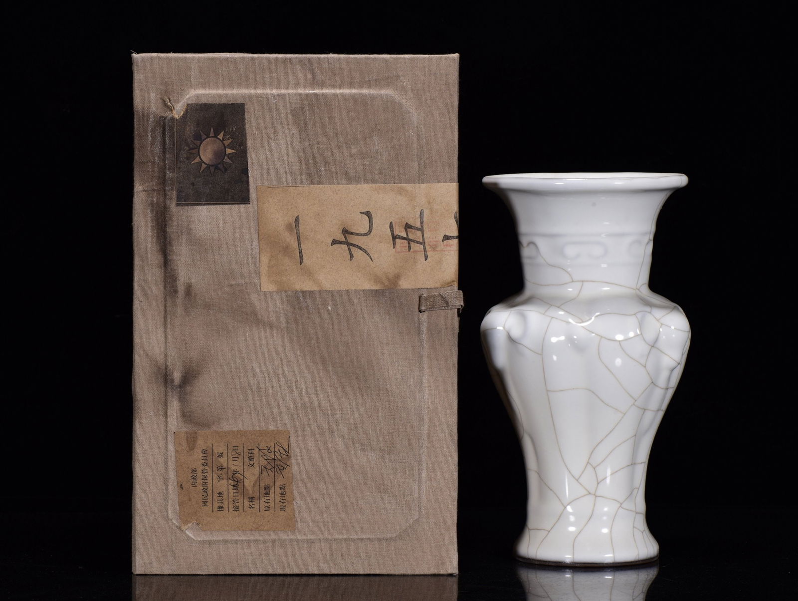 A Rare Guan yao Three Sheep Vase: A Rare Guan yao Three Sheep Vase,Republic of China,Size:(Vase)9.1inx4.7in,(Box)11.4inx7.1inx7.5in 官窑三羊瓶,民国