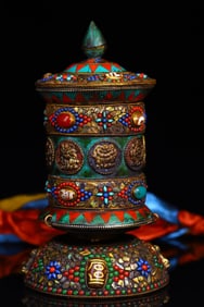 A Exquisite Silver Chiseled and Gem-Inlaid Prayer Wheel