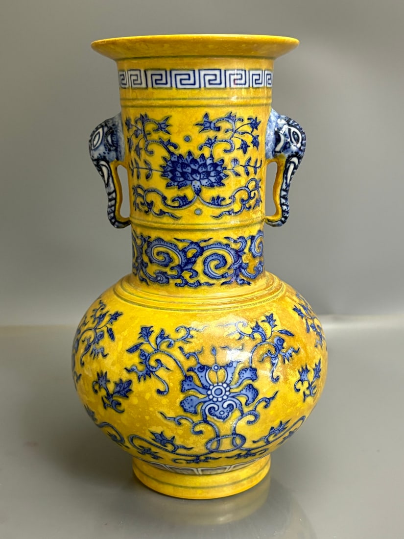 A Exquisite Yellow Ground Blue and White Flower Pattern Elephant-Ears Vase: A Exquisite Yellow Ground Blue and White Flower Pattern Elephant-Ears Vase,Qing Dynasty, China,Qianlong Six-character Mark,Size:8.4in×5.1in 