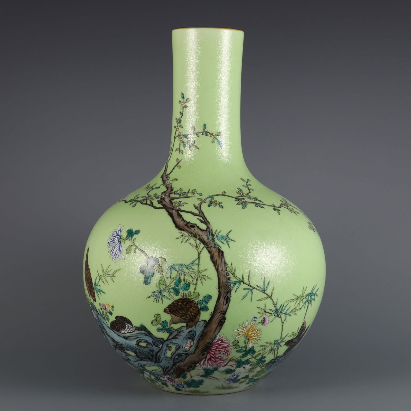 A Rare Apple Green Ground Famille Rose Flower and Bird Pattern Vase: A Rare Apple Green Ground Famille Rose Flower and Bird Pattern Vase,Qing Dynasty, China,Qianlong Six-character Mark,Size:15.2inx10.2in 