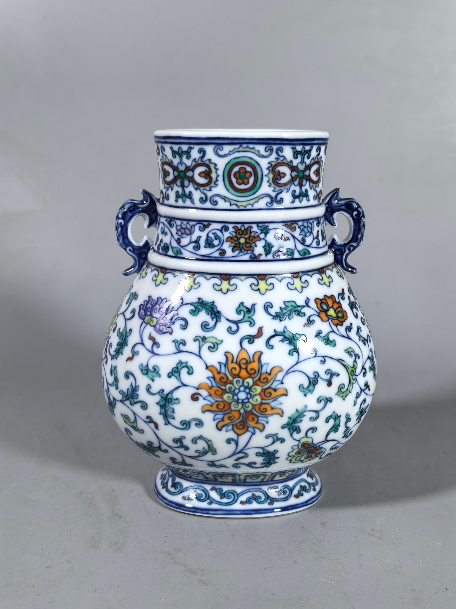 A Exquisite Blue and White Doucai Lotus Pattern Double-Ears Vase: A Exquisite Blue and White Doucai Lotus Pattern Double-Ears Vase,Qing Dynasty, China,Yongzheng Six-character Mark,Size:5.5inx2.4inx4.3inx2.7in 