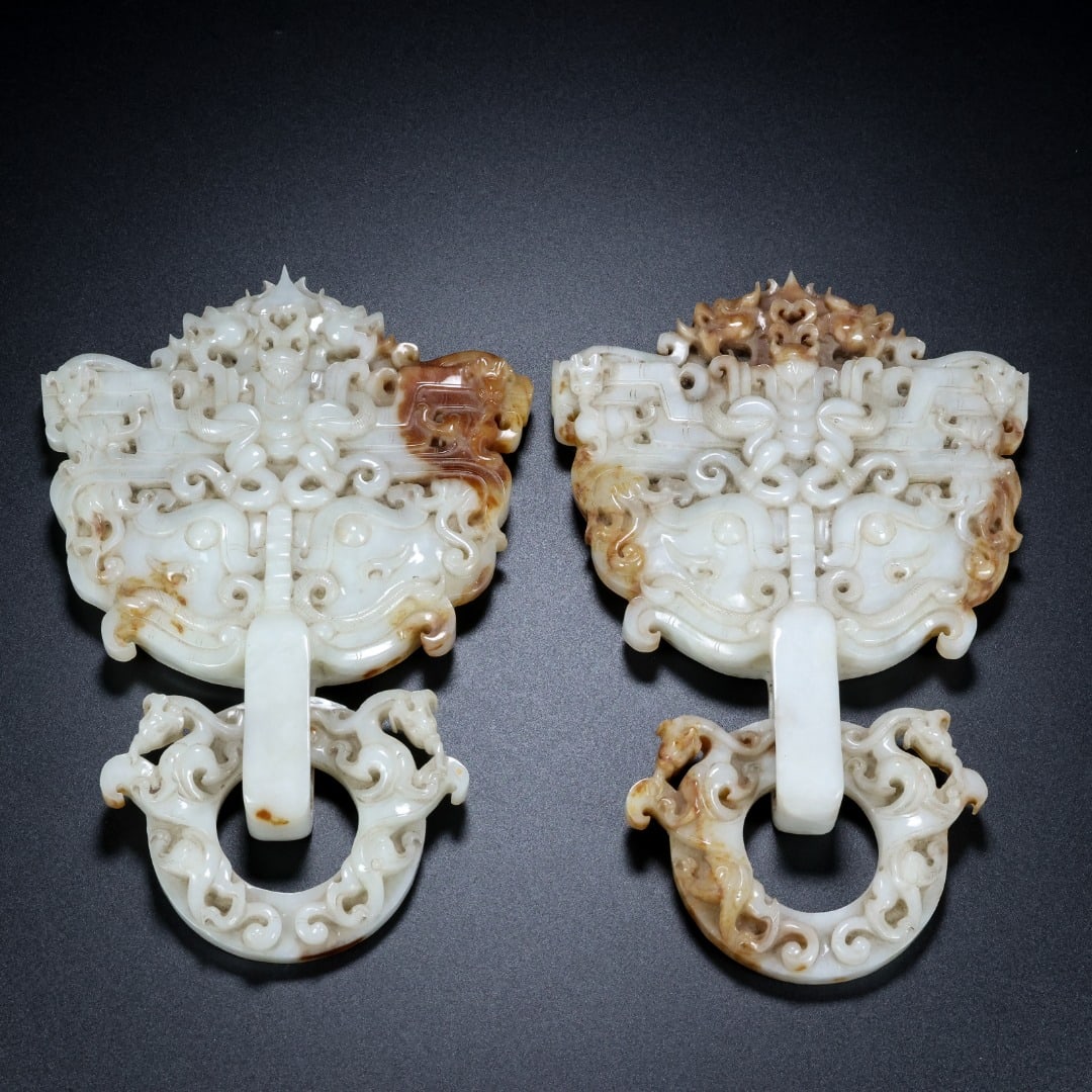 A pair of Exquisite Hotan Jade Beast-Face Pattern Ornament: A pair of Exquisite Hotan Jade Beast-Face Pattern Ornament,Qing Dynasty, China,Size:8.3inx9.3inx0.8in,Weight:485g 