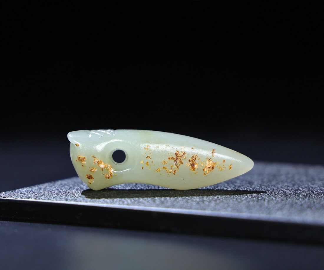 A Exquisite Hetian Jade Tooth-Shaped Handheld Ornament: A Exquisite Hetian Jade Tooth-Shaped Handheld Ornament,Qing Dynasty, China,Size:2.1inx0.7inx0.7in,Weight:21g 