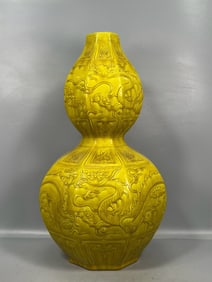 A Exquisite Yellow Glaze Carved Dragon Pattern Vase