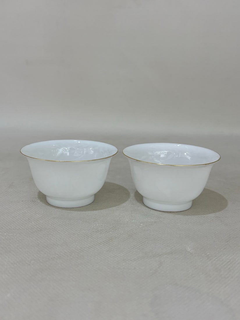 A pair of Exquisite White Glaze Cup: A pair of Exquisite White Glaze Cup,Qing Dynasty, China,Yongzheng Four-character Mark,Size:1.6inx2.8in 