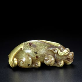 A Rare Hetian Jade Gold-Inlaid Beast