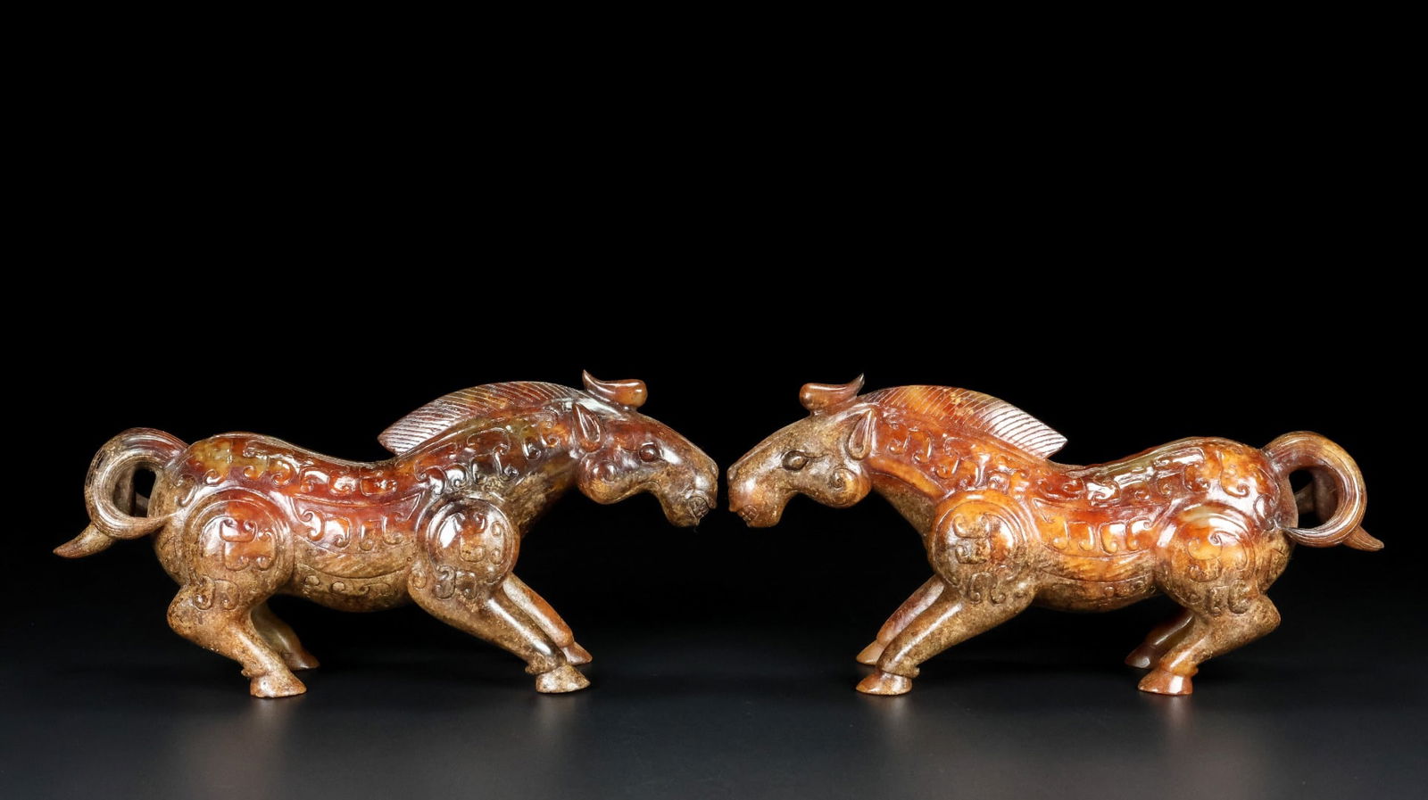 A pair of Exquisite Hotan Jade Horse Ornament: A pair of Exquisite Hotan Jade Horse Ornament,Han Dynasty, China,Size:6.5inx2.5inx2in,Weight:1060g 