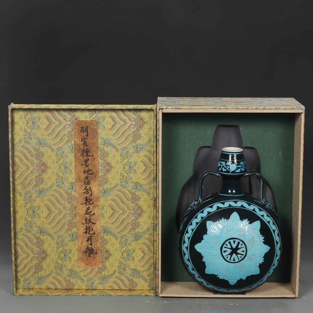 A Exquisite Ink Ground Green Color Flower Pattern Vase: A Exquisite Ink Ground Green Color Flower Pattern Vase,Ming Dynasty, China,Xuande Six-character Mark,Size:12inx1.6inx8.7in 墨地绿彩花卉纹瓶,中