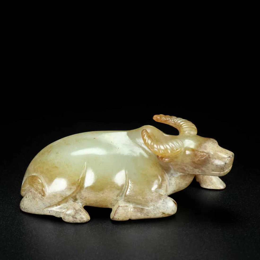 A Exquisite Hotan Jade Buffalo Ornament: A Exquisite Hotan Jade Buffalo Ornament,Han Dynasty, China 和田玉牛,中国汉代