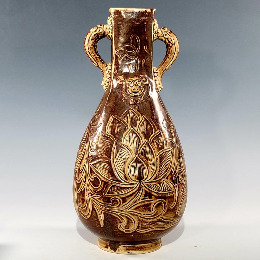 A Exquisite Ding yao Porcelain Soy Glazed Flower Pattern Double-Ears Vase: A Exquisite Ding yao Porcelain Soy Glazed Flower Pattern Double-Ears Vase,Song Dynasty, China,Size:11.4inx4.9in 