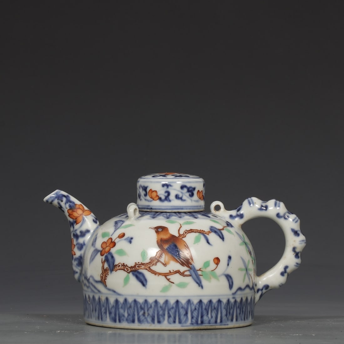 A Exquisite Blue and White Wucai Flower and Bird Pattern Ewer: A Exquisite Blue and White Wucai Flower and Bird Pattern Ewer,Ming Dynasty, China,Size:4.5inx1.4inx5.1in 