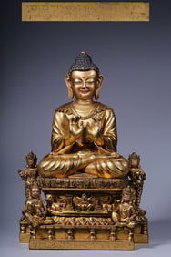 A Solemn Gilt Bronze Statue of Vairocana Buddha