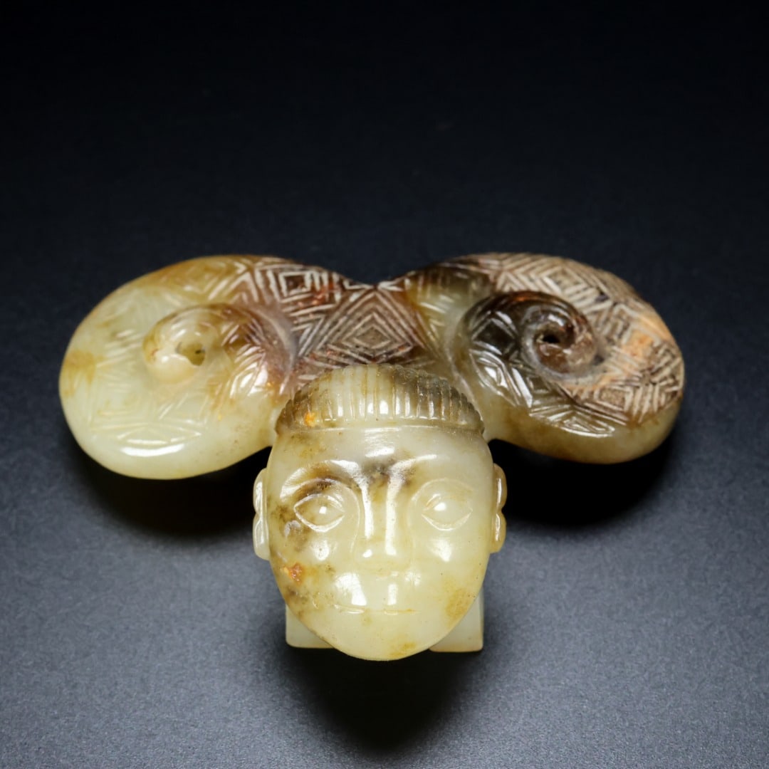 A Exquisite Hetian Jade Human-Head Ornament (1 of 9)