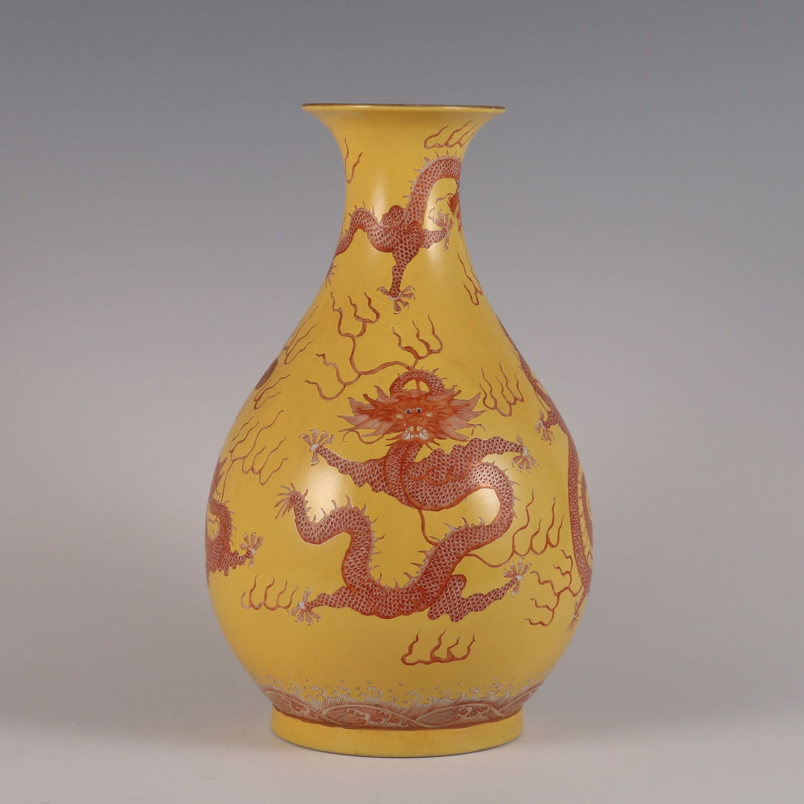 A Rare Yellow Ground Iron Red Color Cloud and Dragon Pattern Vase: A Rare Yellow Ground Iron Red Color Cloud and Dragon Pattern Vase,Qing Dynasty, China,Daoguang Six-character Mark,Size:11.3inx6.7in 黄地矾红彩云龙纹