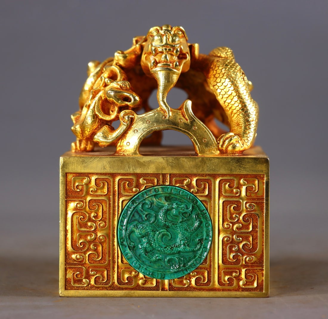 An Exquisite Gilt Bronze Dragon Pattern Seal,Inlaid Turquoise: An Exquisite Gilt Bronze Dragon Pattern Seal,Inlaid Turquoise,Qing Dynasty,China,Size:4.7inx3.5in,Weight:4334g 