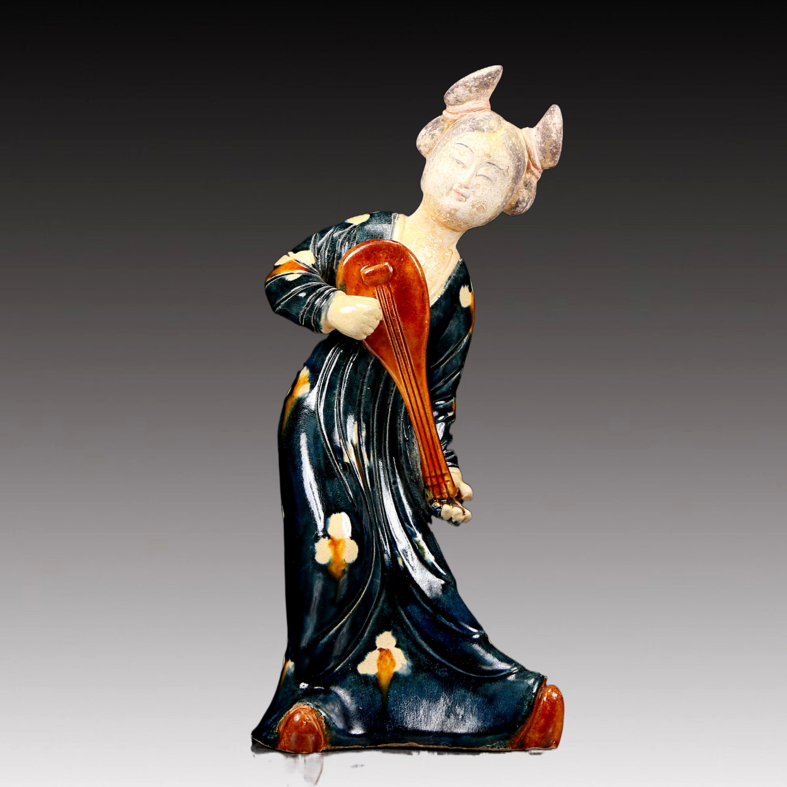 A Rare Tang Tri-Color Glazed Pottery Dancing Figurines: A Rare Tang Tri-Color Glazed Pottery Dancing Figurines,Tang Dynasty, China,Chinese Tang Tri-colored Pottery, or Tang Sancai, flourished during the Tang Dynasty (618–907 AD). It's renowned for it