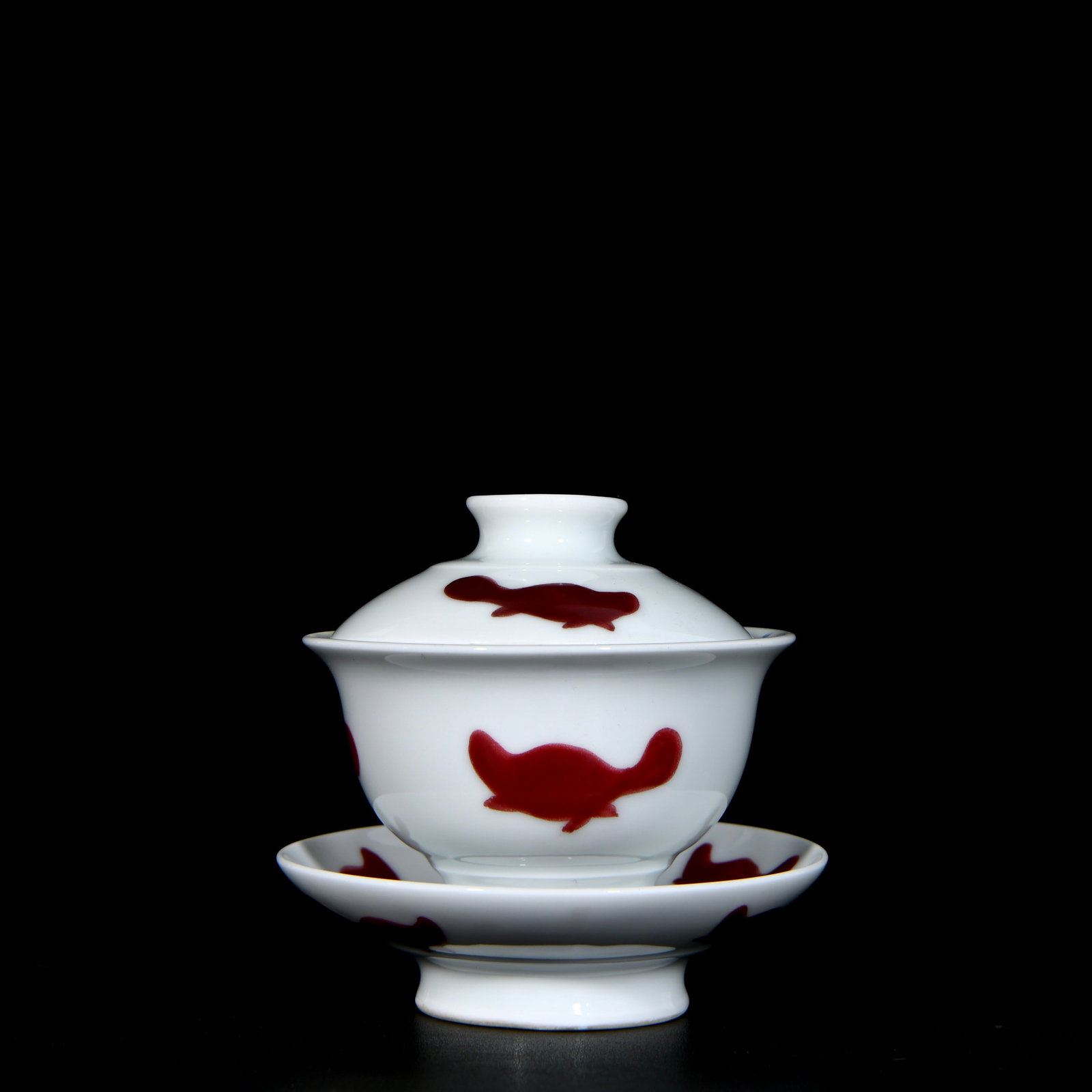 An Exquisite Underglaze-Red Fish Pattern Cover Bowl,With Tray: An Exquisite Underglaze-Red Fish Pattern Cover Bowl,With Tray,Ming Dynasty, China,Yongle Four-character Mark,Size:3.9inx4.3in 釉里红鱼纹盖碗,带托&