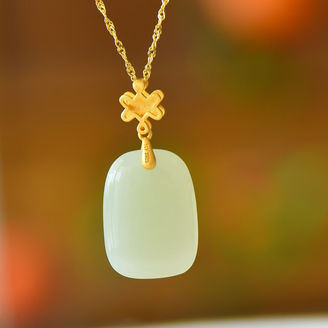An Exquisite Sterling Silver-Gold Plated Inlaid White Jade Pendant: An Exquisite Sterling Silver-Gold Plated Inlaid White Jade Pendant,Size:18mmx25mm 纯银镀金镶白玉吊坠
