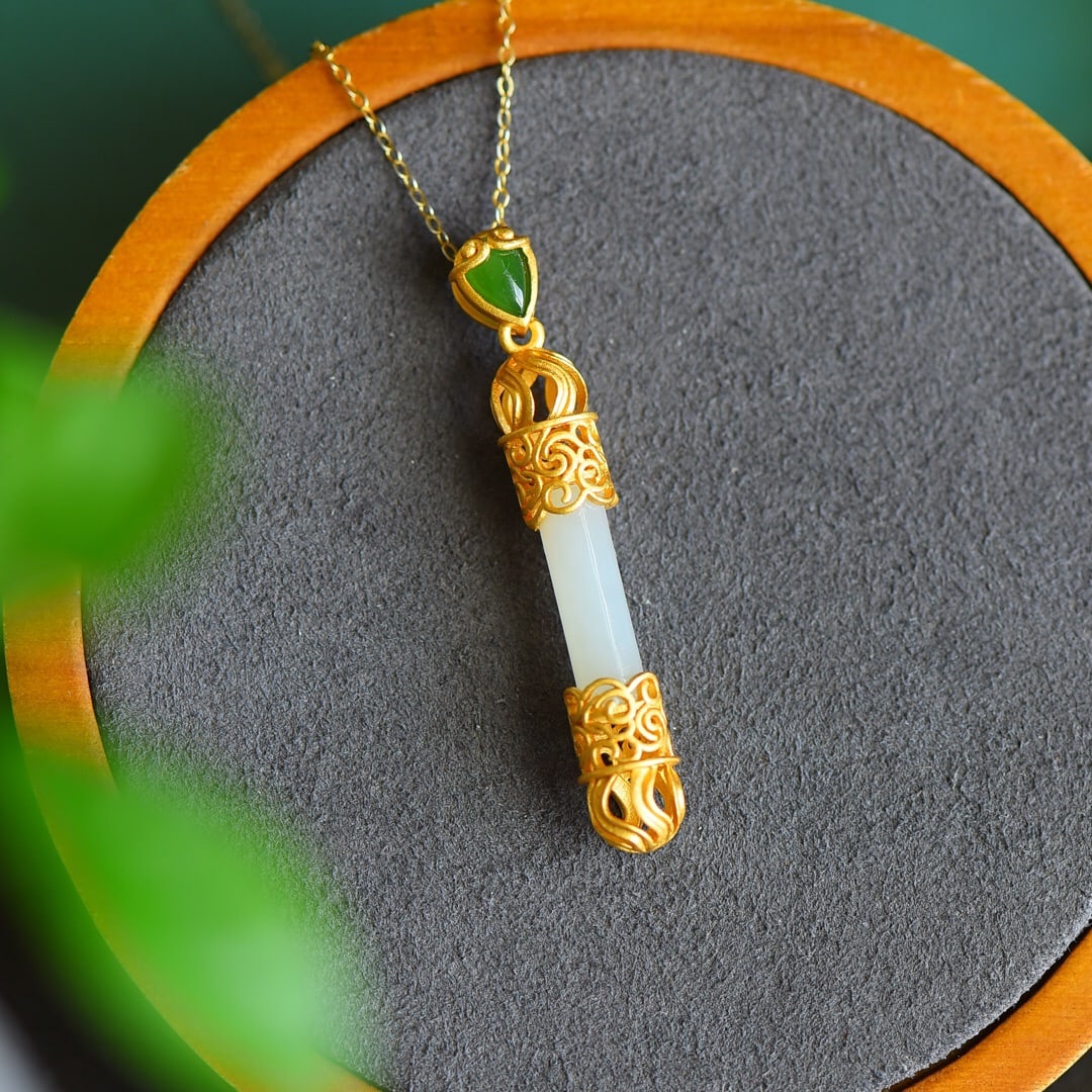 An Exquisite Sterling Silver-Gold Plated Inlaid White Jade Pendant: An Exquisite Sterling Silver-Gold Plated Inlaid White Jade Pendant 纯银镀金镶白玉吊坠
