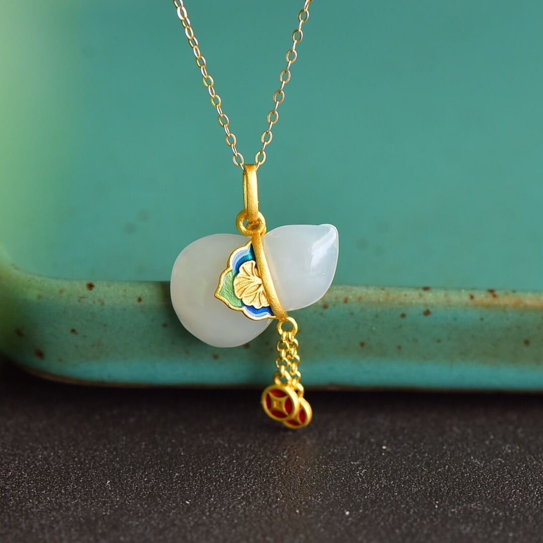 An Exquisite Sterling Silver-Gold Plated Inlaid White Jade Pendant: An Exquisite Sterling Silver-Gold Plated Inlaid White Jade Pendant 纯银镀金镶白玉吊坠