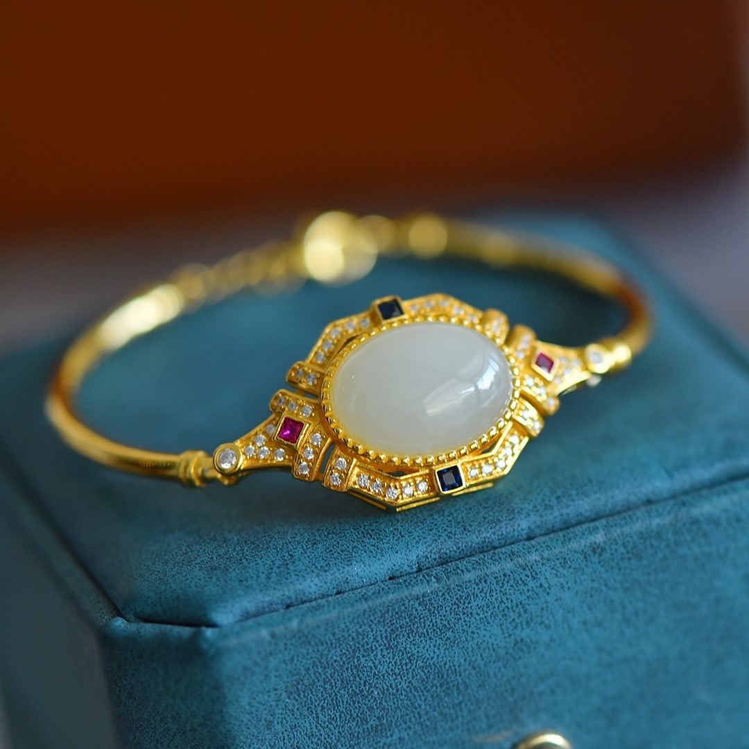 An Exquisite Sterling Silver-Gold Plated Inlaid White Jade Bracelets,Inlaid Diamonds: An Exquisite Sterling Silver-Gold Plated Inlaid White Jade Bracelets,Inlaid Diamonds,Size:12mmx16mm 纯银镀金镶白玉手镯,嵌钻石