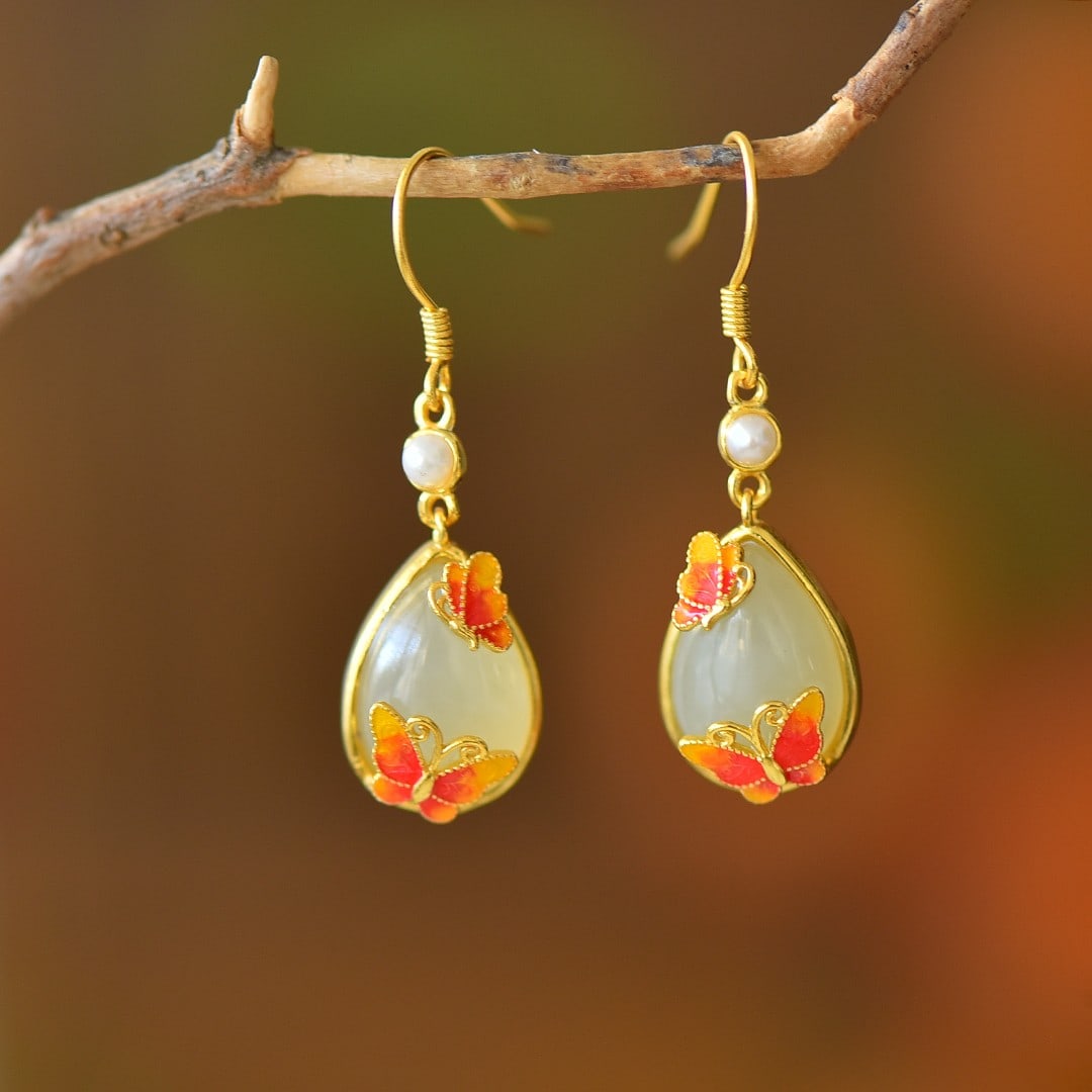 A Pair of Exquisite Sterling Silver-Gold Plated Inlaid White Jade Earrings: A Pair of Exquisite Sterling Silver-Gold Plated Inlaid White Jade Earrings 一对纯银镀金镶白玉耳环