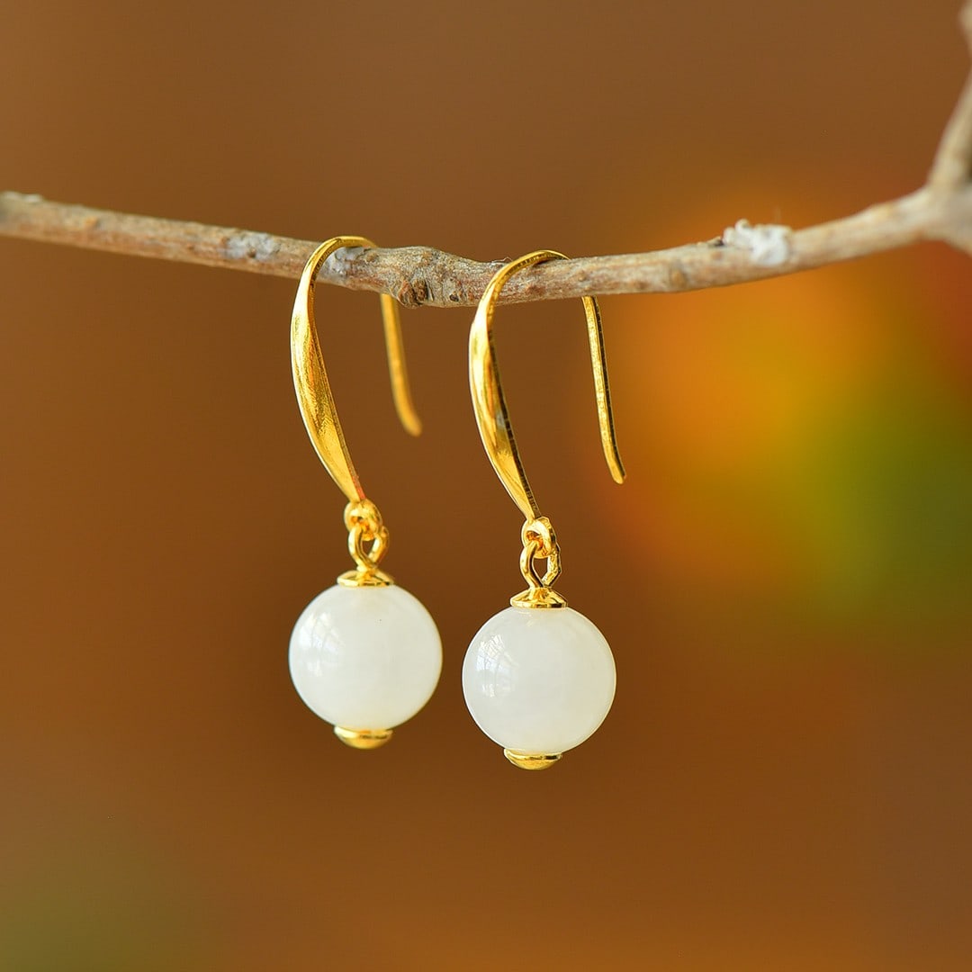 A Pair of Exquisite Sterling Silver-Gold Plated Inlaid White Jade Earrings: A Pair of Exquisite Sterling Silver-Gold Plated Inlaid White Jade Earrings,Size:8mmx8mm 一对纯银镀金镶白玉耳环