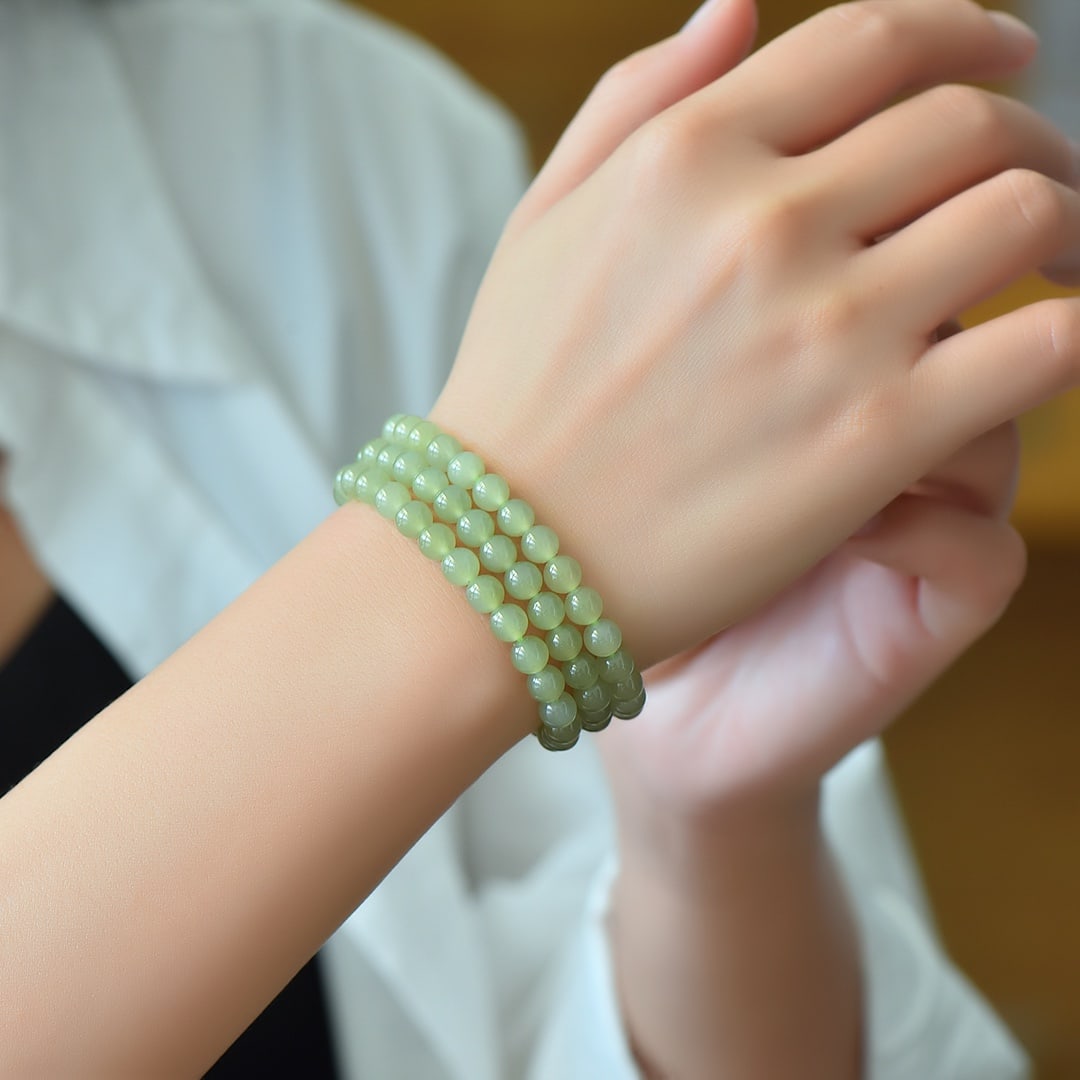 An Exquisite Greenish Jade Bracelets (1 of 6)