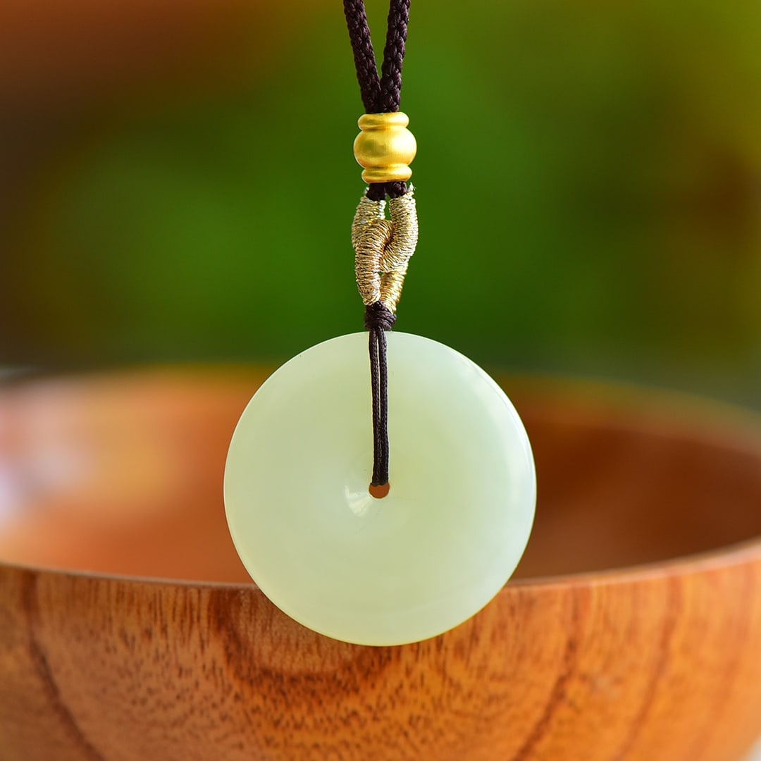 An Exquisite Greenish Jade Pendant (1 of 5)