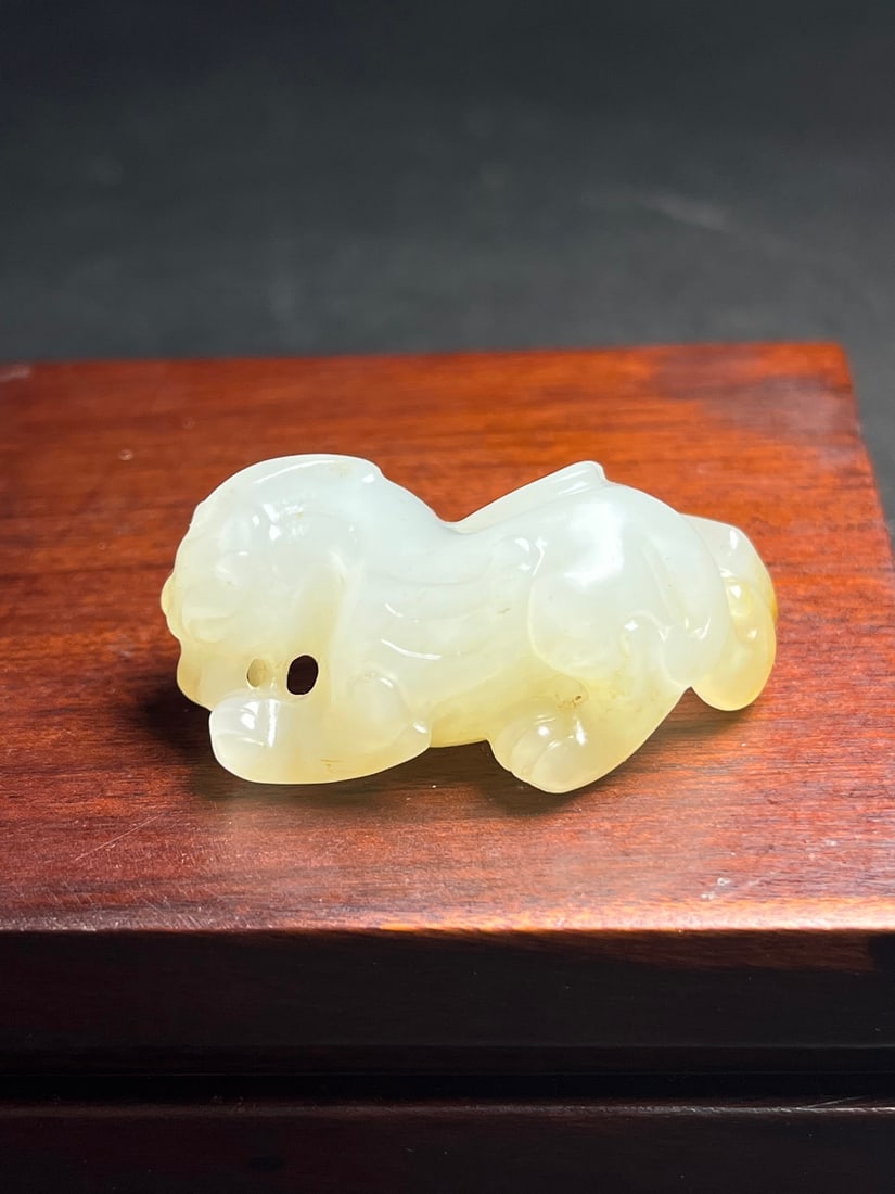 An Exquisite White Jade Auspicious Beast Pendant (1 of 7)