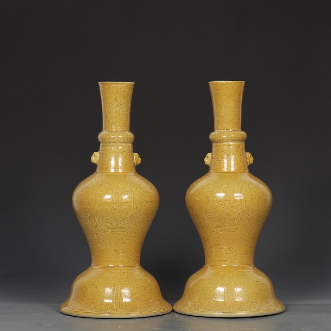 A Pair of Exquisite Yellow Glazed Figure and Story Pattern Double-Ears Candlesticks: A Pair of Exquisite Yellow Glazed Figure and Story Pattern Double-Ears Candlesticks,Ming Dynasty,China,Jiajing Six-Character Mark,Size:13.6inx6.5in 