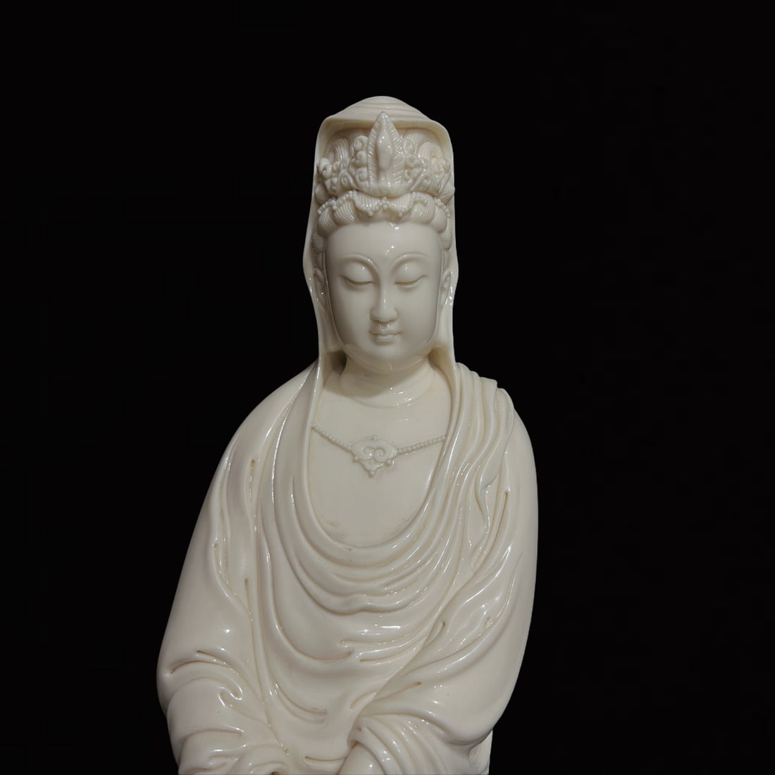 A Solemn Blance-De-Chine Statue of Avalokitesvara (1 of 8)