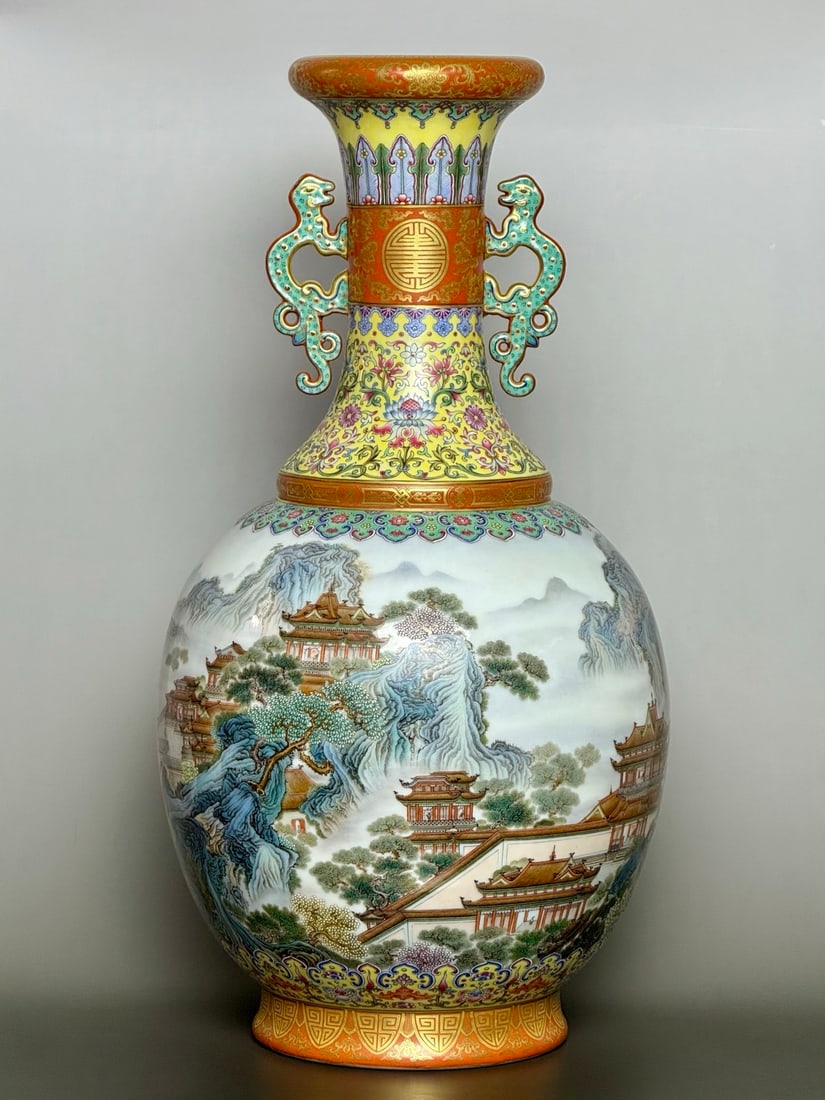An Exquisite Yellow Ground Enamel Painted Gold Landscape Pattern Double-Ears Vase: An Exquisite Yellow Ground Enamel Painted Gold Landscape Pattern Double-Ears Vase,Qing Dynasty,China,Qianlong Four-character Mark,Size:21.1inx10.6in 
