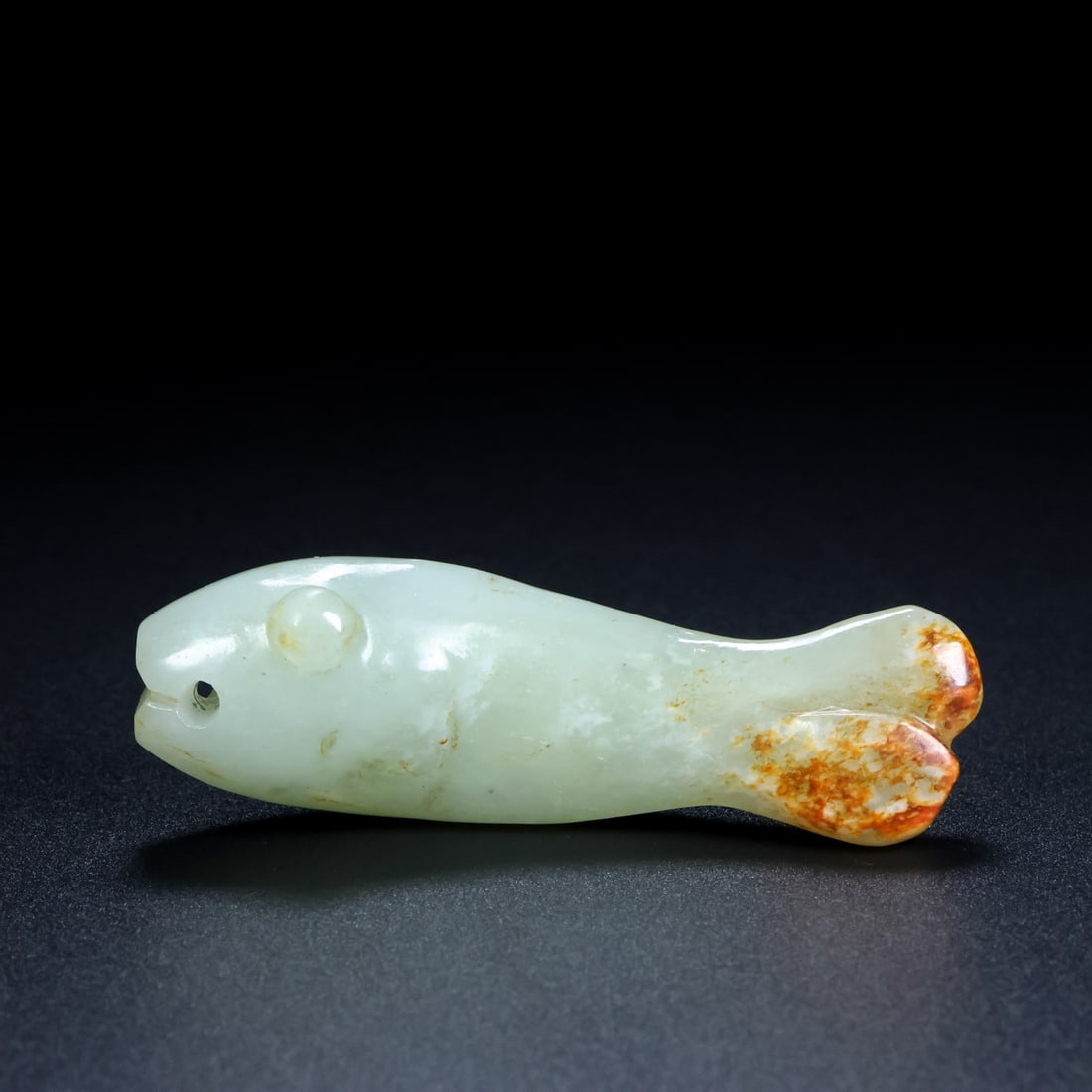An Exquisite White Jade Fish Ornament (1 of 9)