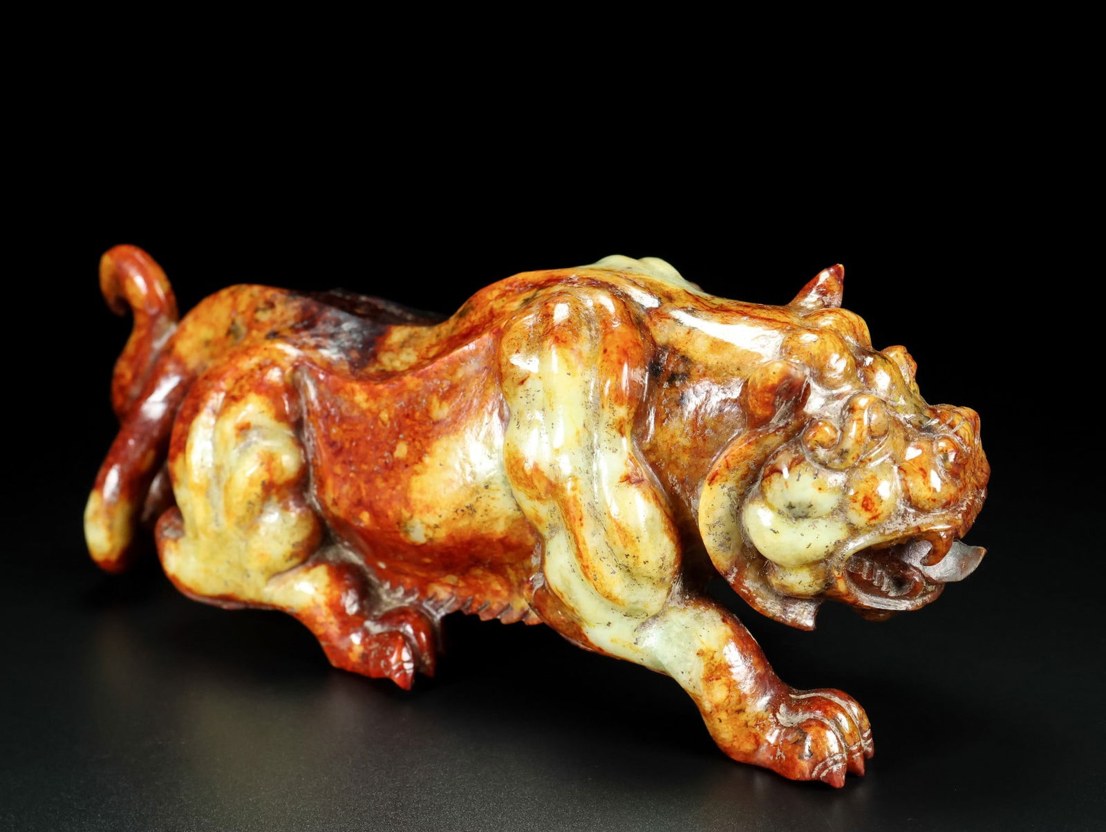 An Exquisite White Jade Auspicious Beast Ornament (1 of 9)