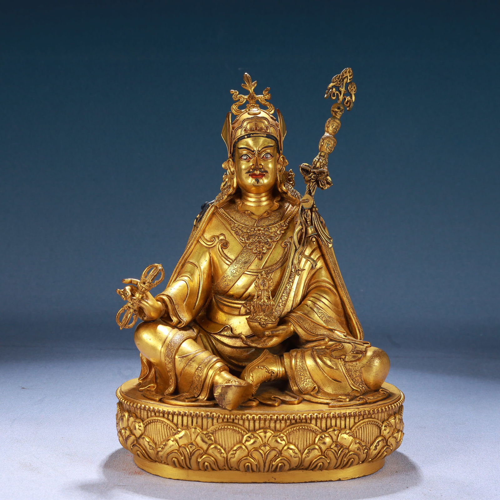 A Solemn Gilt Bronze Statue of Padma Sambhava: A Solemn Gilt Bronze Statue of Padma Sambhava,Qing Dynasty, China,Qianlong Mark,Size:6.3inx5.1inx9.1in,Weight:2900g 铜鎏金莲花生大士像,中