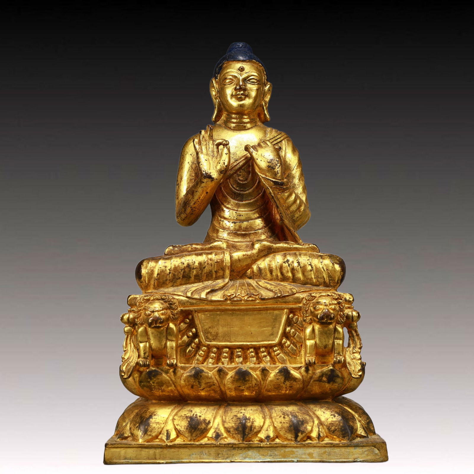 A Solemn Gilt Bronze Statue of Sakyamuni: A Solemn Gilt Bronze Statue of Sakyamuni,Ming Dynasty, China,Size:5.1inx3.5inx8.3in,Weight:1950g 铜鎏金释迦摩尼像,中国明代