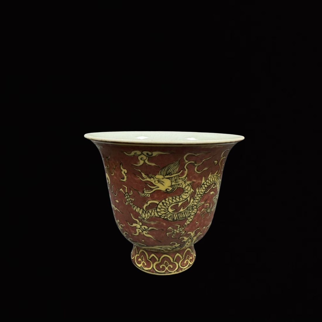 An Exquisite Red Ground Yellow Glazed Auspicious Cloud and Dragon Pattern Cup: An Exquisite Red Ground Yellow Glazed Auspicious Cloud and Dragon Pattern Cup,Ming Dynasty,China,Jiajing Six-Character Mark,Size:4.5inx5.1in 