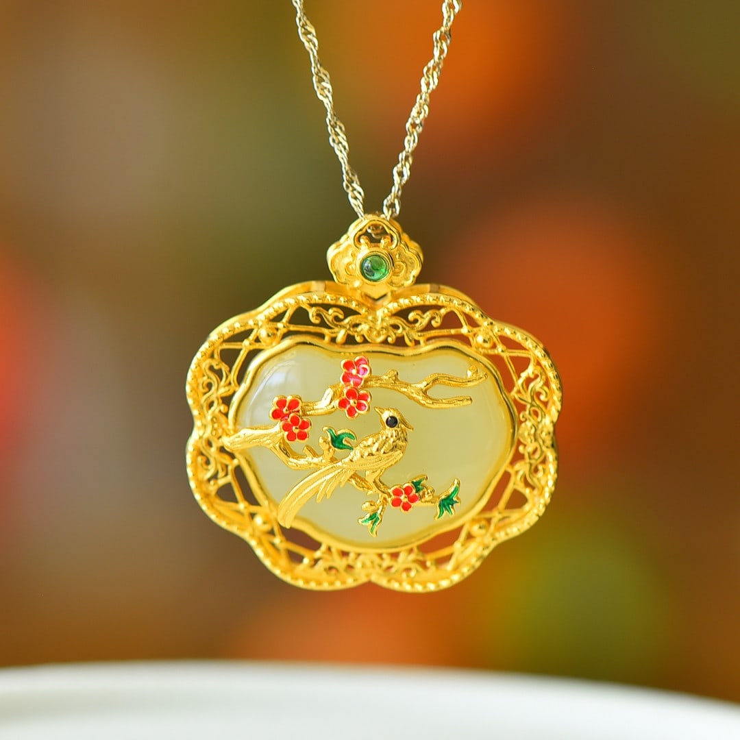 An Exquisite Sterling Silver-Gold Plated Inlaid White Jade Pendant: An Exquisite Sterling Silver-Gold Plated Inlaid White Jade Pendant,Size:0.6inx0.9in 纯银镀金镶白玉吊坠