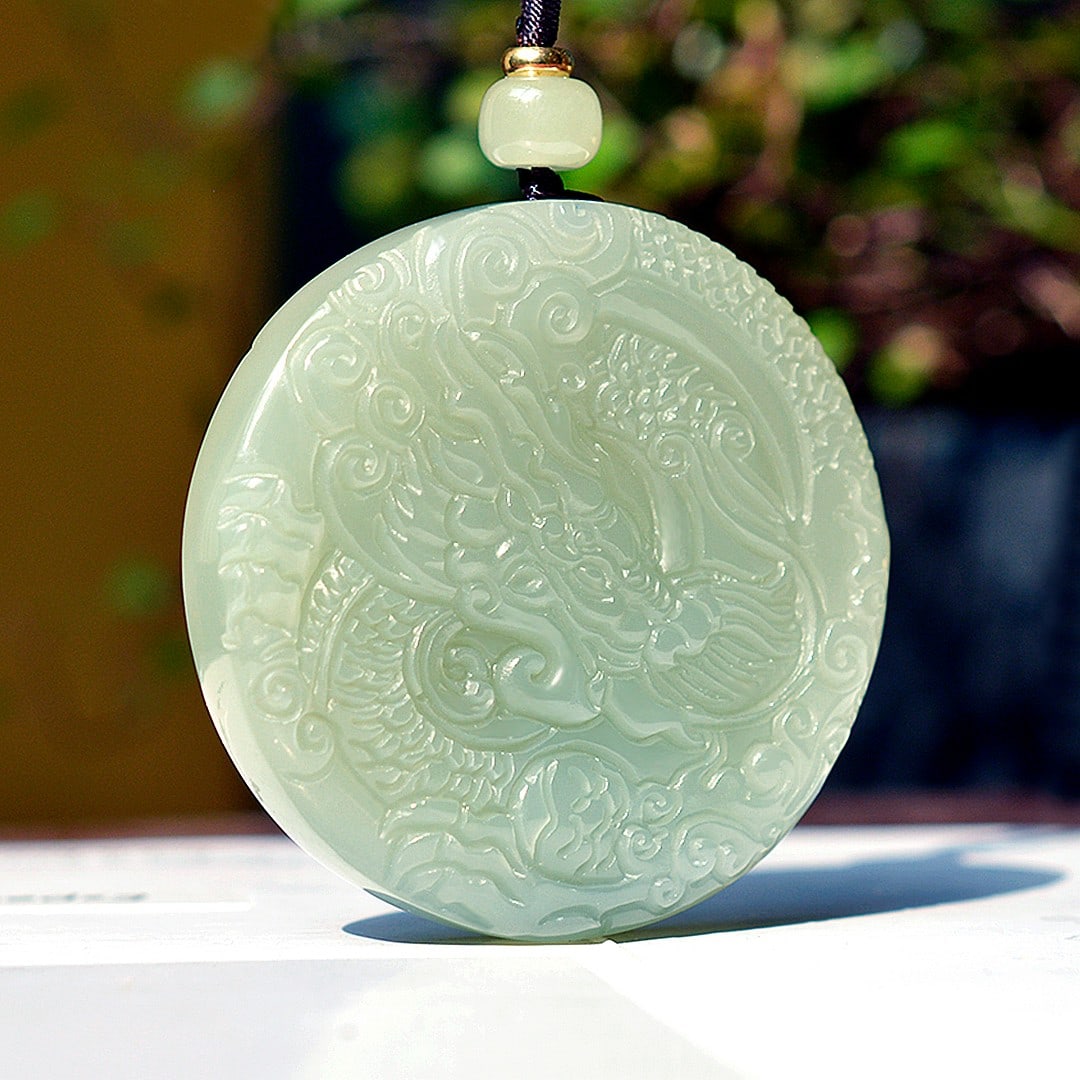 An Exquisite Greenish Jade Dragon and Phoenix Pattern Pendant (1 of 4)