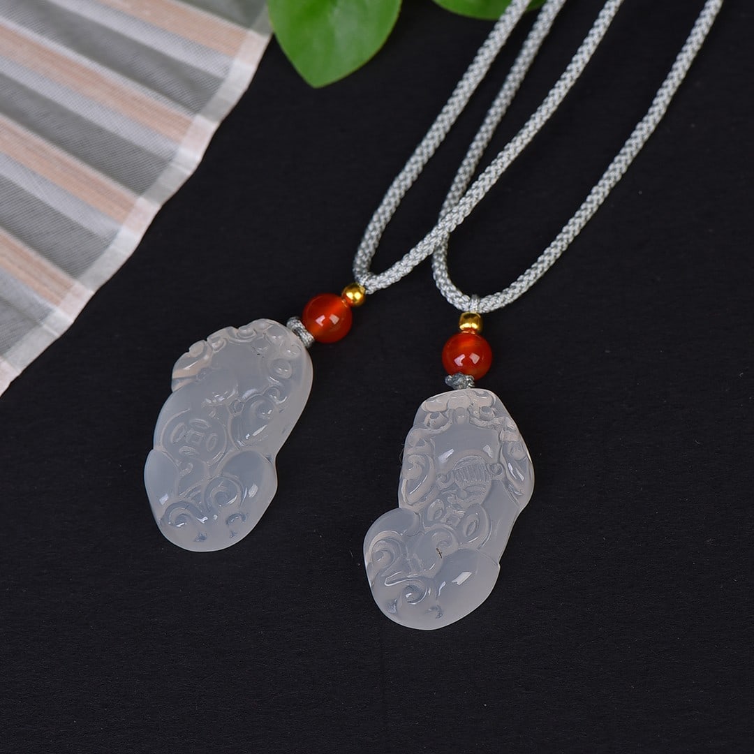 A Pair of Exquisite Jadeite Wealth-Attracting Creature Pattern Pendants: A Pair of Exquisite Jadeite Wealth-Attracting Creature Pattern Pendants,Size:0.7inx1.2in 一对翡翠貔貅纹挂件