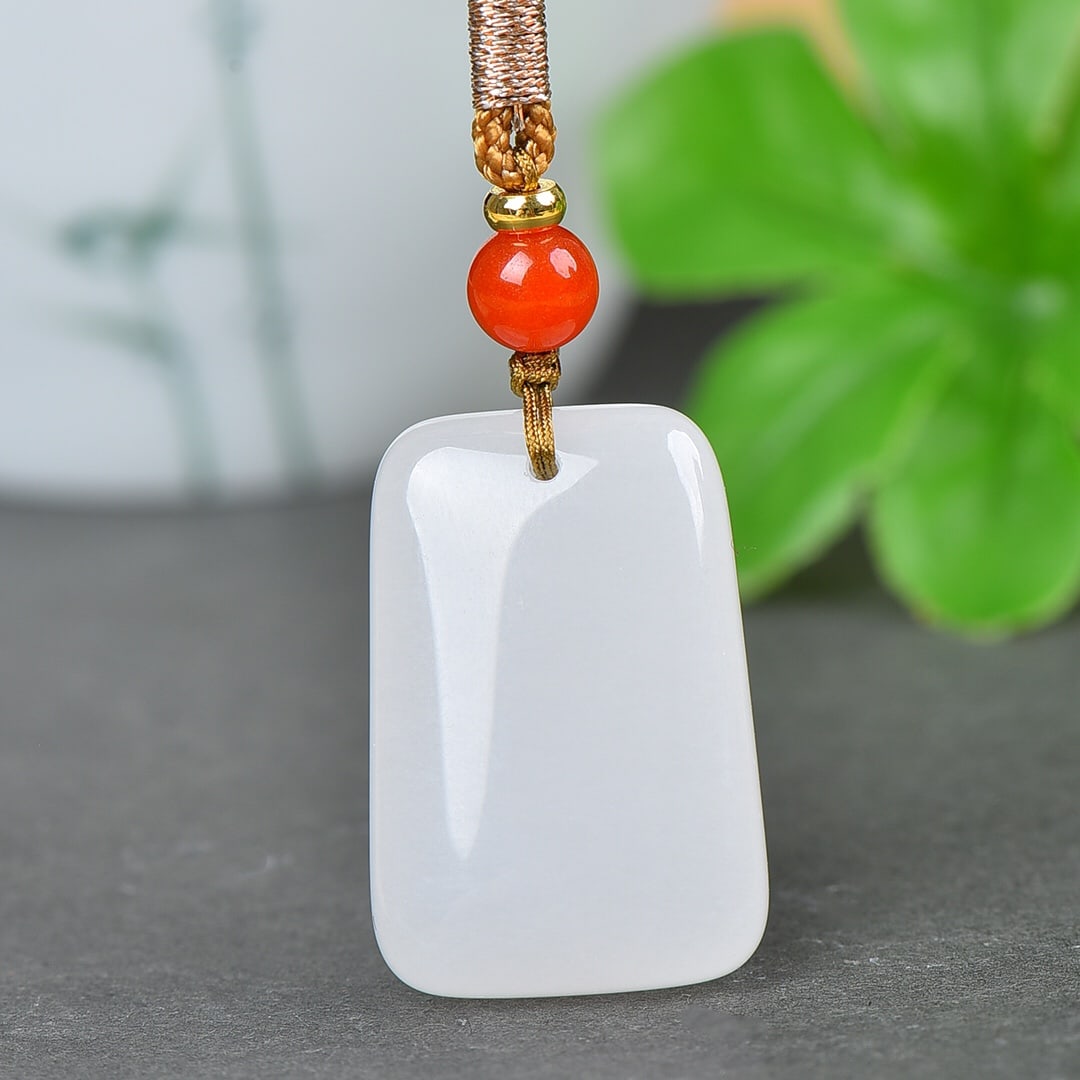 An Exquisite White Jade Pendant: An Exquisite White Jade Pendant,Size:0.7inx1.1in 白玉挂件