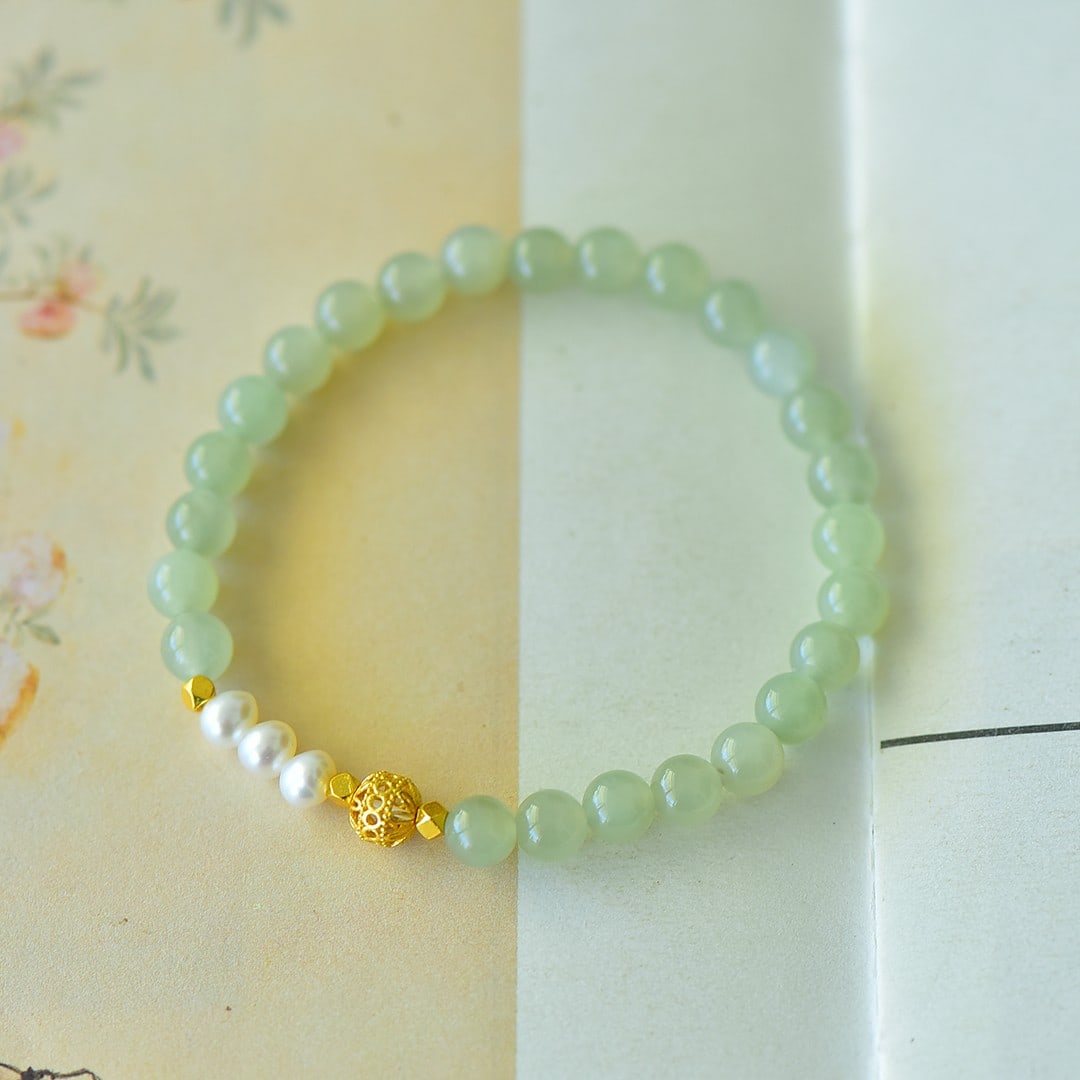 An Exquisite Sterling Silver-Gold Plated Inlaid Sapphire Bracelet,Inlaid Pearl: An Exquisite Sterling Silver-Gold Plated Inlaid Sapphire Bracelet,Inlaid Pearl 纯银镀金镶青玉手链,嵌珍珠