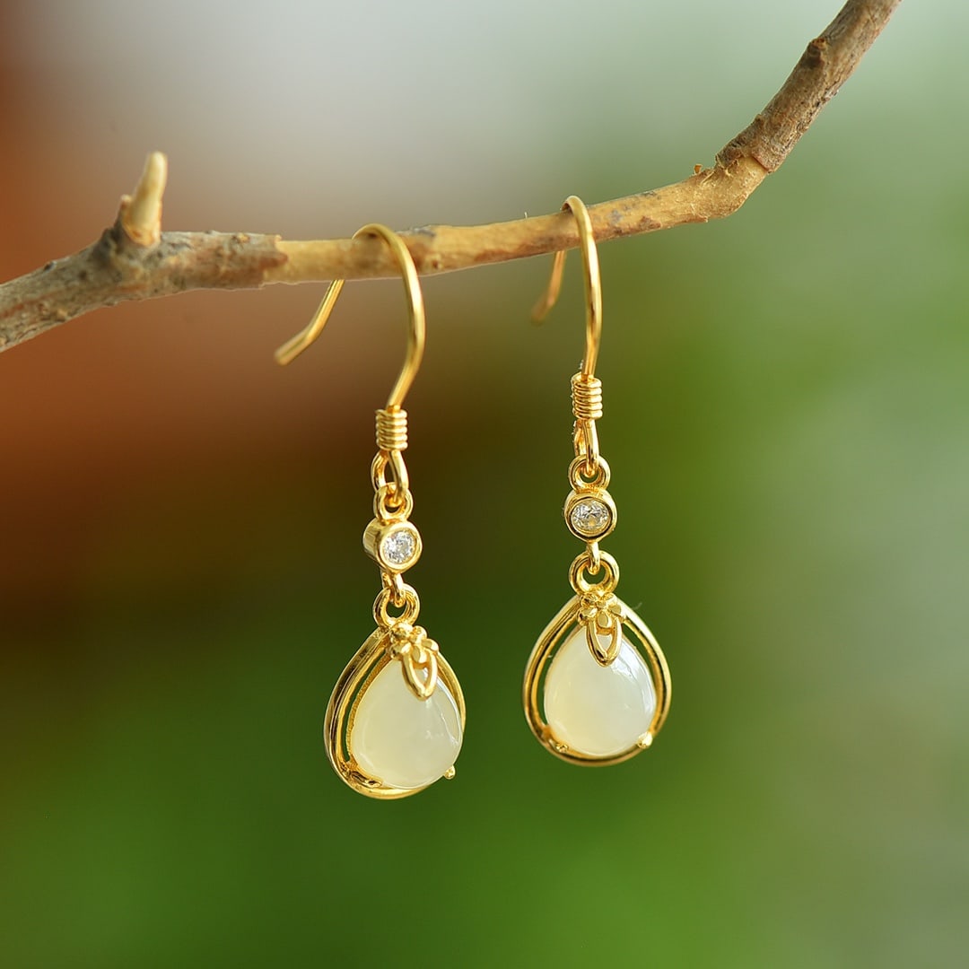 A Pair of Exquisite Sterling Silver-Gold Plated Inlaid White Jade Earrings: A Pair of Exquisite Sterling Silver-Gold Plated Inlaid White Jade Earrings,Size:0.2inx0.3in 一对纯银镀金镶白玉耳环