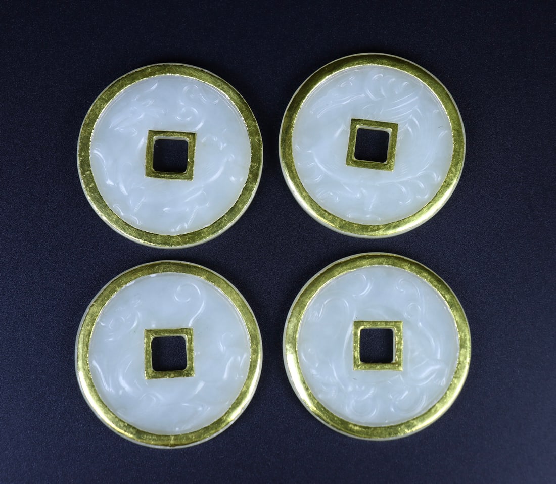 A Set of Fine White Jade Cover with Gold Ornament: A Set of Fine White Jade Cover with Gold Ornament Qing Dynasty, China Size:2inx0.2in Weight:110g白玉包金四神玉币 中国清代