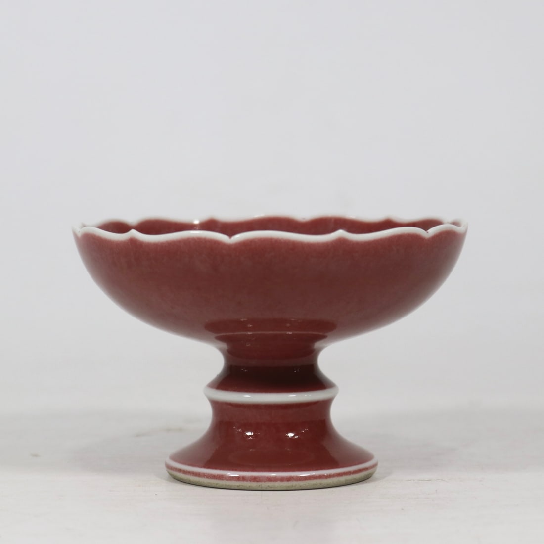 An Exquisite PeachBloom-Glazed Candlestick: An Exquisite PeachBloom-Glazed Candlestick Qing Dynasty, China Yongzheng Six-character Mark Size:2.8inx4.3in豇豆红香插 中国清代